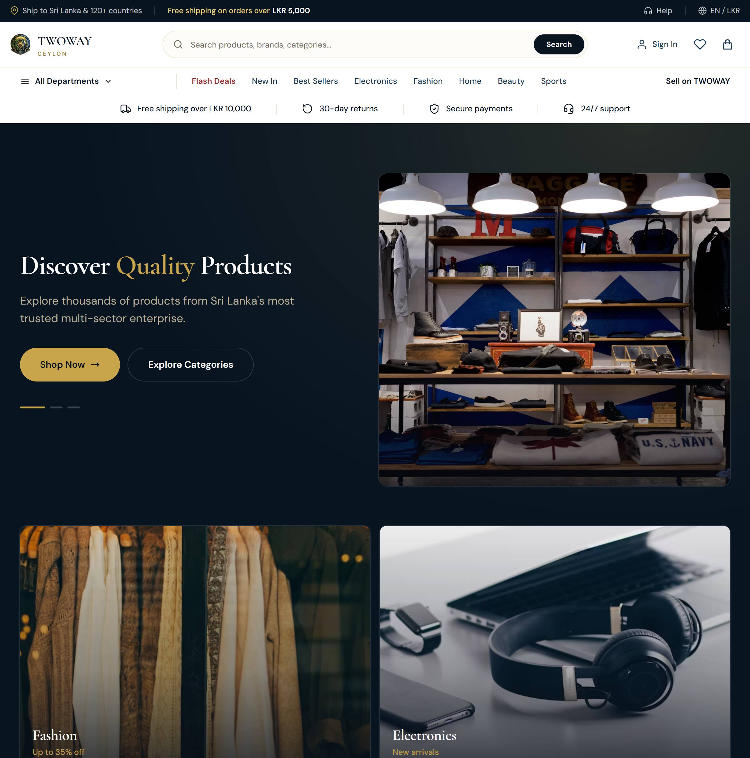 The TWOWAY Ceylon home page: a lit shelf of goods behind the line “Discover Quality Products”, over the fashion and electronics tiles.
